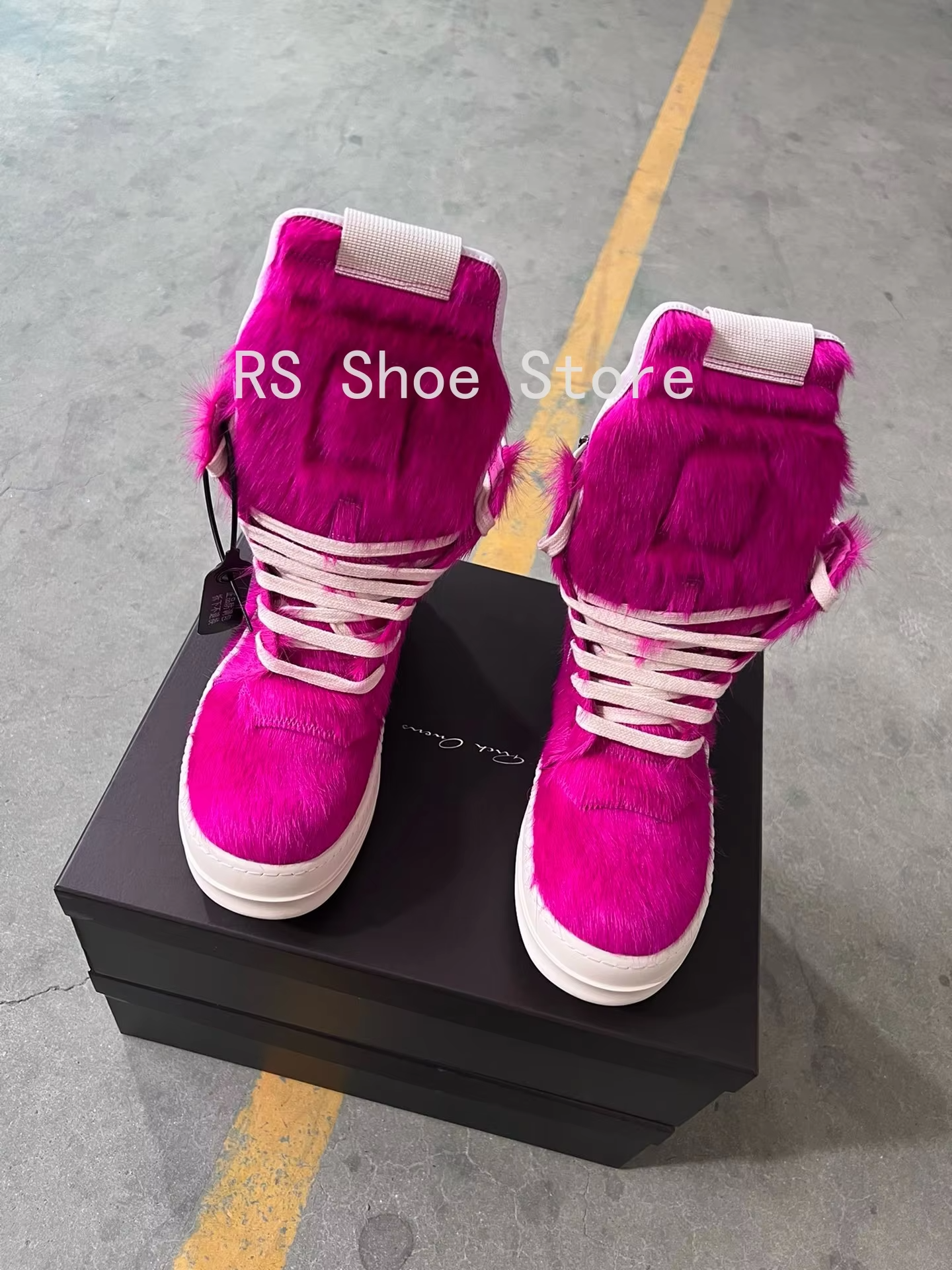 High-top silhouette and extended tongue