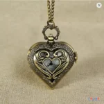 vintage-heart-pocket-watch-necklace-chain-crown-closeup