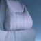 Car seat headrest lumbar support