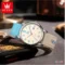 olevs-canvas-watch-red-white-strap-handheld