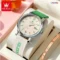 olevs-canvas-watch-red-white-strap-handheld