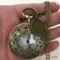 vintage-bronze-gear-pocket-watch-handheld