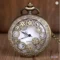 vintage-bronze-gear-pocket-watch-handheld