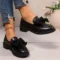 womens-black-bow-loafers-closeup